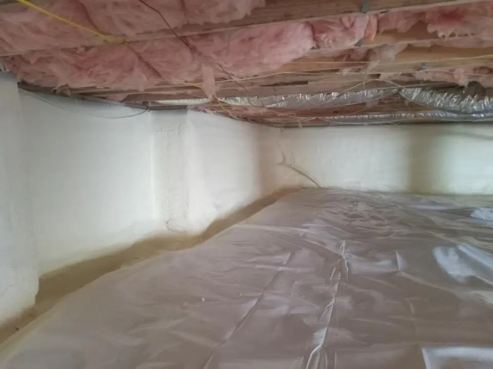 Crawl space encapsulation with closed-cell spray foam for Commercial Roof Restoration in Porters Neck